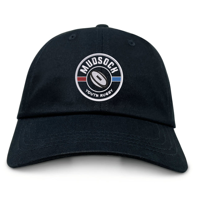 The EMB S&S Activewear Mudsock Rugby Adult Low-Profile Cotton Twill Dad Cap is black with a circular "Mudsoch Youth Rugby" patch featuring a rugby ball and red, white, and blue accents.