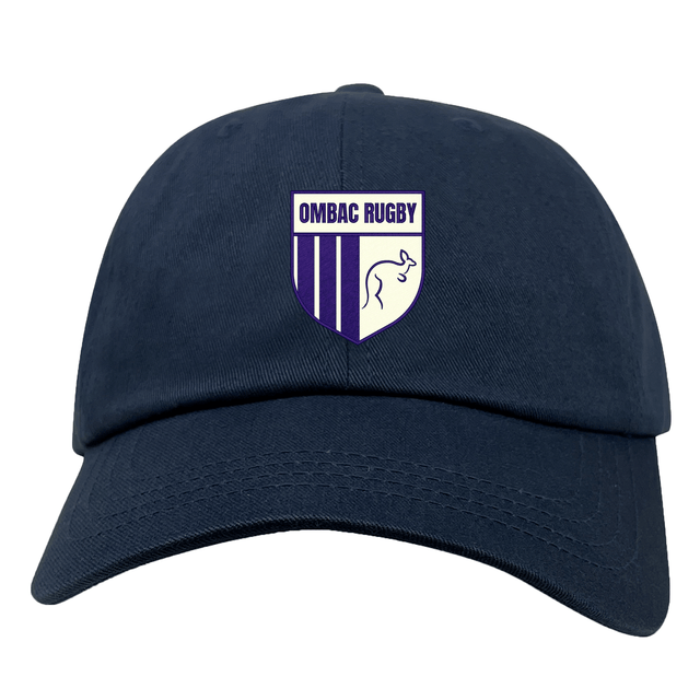 The EMB S&S Activewear OMBAC Rugby Adult Low-Profile Cotton Twill Dad Cap is navy blue with purple stripes and a stylized animal outline logo on the front.