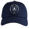 Introducing the New Saint Andrews College Adult Low-Profile Cotton Twill Dad Cap by EMB S&S Activewear: a navy blue hat featuring “New Saint Andrews RFC 1994” and a white embroidered crest on the front, combining classic team style with a timeless dad cap design.