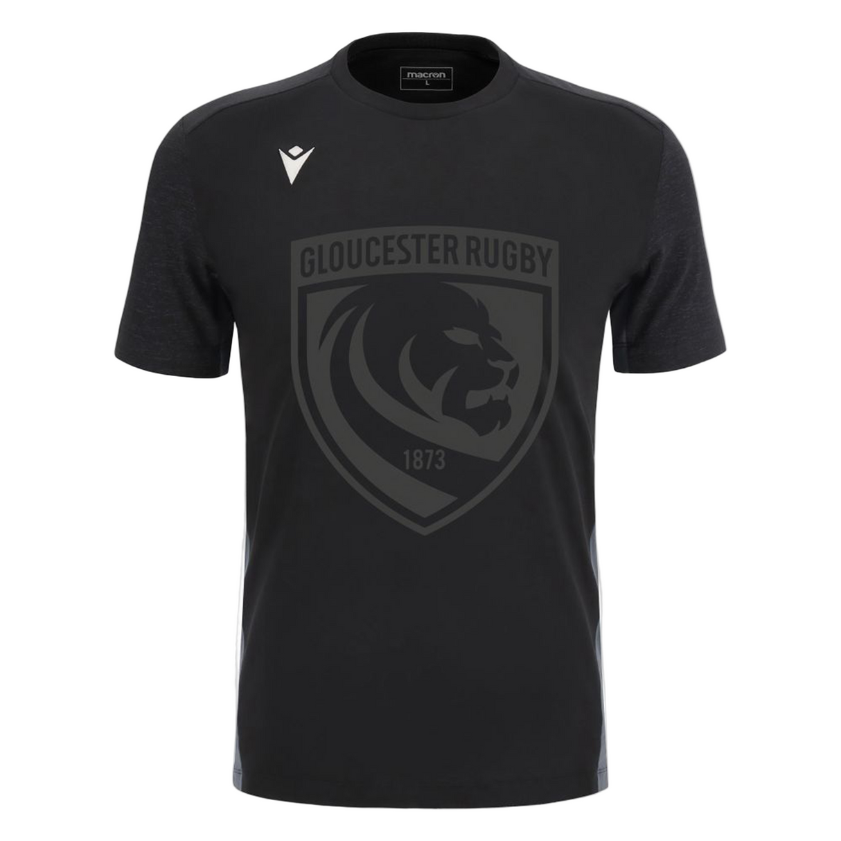 The Gloucester 25/26 Cotton Travel T-Shirt by Macron is black with a large dark grey lion crest and "1873" on the front, plus a white Macron logo on the right shoulder.