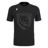 The Gloucester 25/26 Cotton Travel T-Shirt by Macron is black with a large dark grey lion crest and "1873" on the front, plus a white Macron logo on the right shoulder.