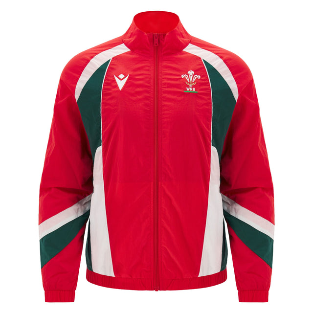 The Wales WRU 26/27 Heritage Retro Jacket by Macron is a red zip-up jacket with green and white accents, featuring the Welsh Rugby Union logo on the left chest and the Macron logo on the right, showcasing classic heritage rugby style from Macron.