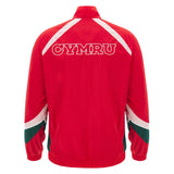 The Wales WRU 26/27 Heritage Retro Jacket by Macron features a striking red design with white and green accents. “CYMRU” is prominently displayed in bold white letters across the upper back, making this Macron jacket a standout retro piece for any Wales supporter.