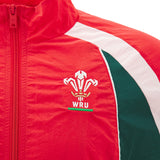 The Wales WRU 26/27 Heritage Retro Jacket by Macron features a distinctive red design with the official WRU logo, accented by white and green stripes on the shoulder and chest. Blending classic heritage rugby style with modern comfort, this jacket from Macron is perfect for any Wales supporter.