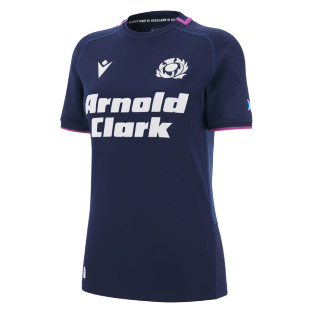 Women's Scotland 25/26 Replica Home Jersey by Macron features navy blue short sleeves, a white "Arnold Clark" sponsor logo, Scottish Rugby crest, and pink collar trim.