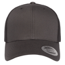 Front view of the S&S Activewear Retro Trucker Cap with a plain black front, mesh back, round brim sticker, and classic snapback closure.