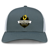 The Chicago Riot Retro Trucker Cap by EMB S&S Activewear features gray and white panels, an embroidered club logo with a raised fist and five stars, and an adjustable snapback for comfort.