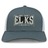 The Lewis County Elks Retro Trucker Cap by EMB S&S Activewear features a gray and white design with “Lewis County Elks Rugby” boldly embroidered on the front in white and black lettering, and includes an adjustable snapback closure for a comfortable fit.