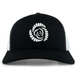 The Missoula All-Maggots Retro Trucker Cap by EMB S&S Activewear is a black and white trucker cap with an embroidered spiral seashell design in white on the front panel, featuring an adjustable snapback closure for a comfortable fit.