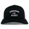 The EMB S&S Activewear Birmingham Rugby Text Logo Retro Trucker is a black and white hat featuring “Birmingham Rugby” text and a small anvil logo embroidered on the front. This cap offers a classic snapback closure for an adjustable fit.