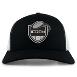 ICRON Retro Trucker Cap in black and white with an embroidered design featuring a shield, a football, and the text “ICRON.”