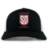 Legion Academy Retro Trucker Cap in black and white featuring an embroidered red and white “Legion Academy SD” shield emblem on the front with a snapback closure.