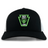 Rock Rugby Retro Trucker Cap in black and white with a green and black embroidered crest on the front reading “ROCK RUGBY LIONS.”