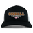 Introducing the Godzilla Rugby Football Club Retro Trucker Cap by EMB S&S Activewear—a black and white hat featuring “GODZILLA RUGBY FOOTBALL CLUB” embroidered on the front, a bold pink flower, “1993,” and a classic adjustable snapback closure for an ideal fit.