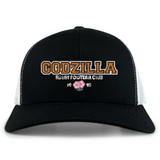 Introducing the Godzilla Rugby Football Club Retro Trucker Cap by EMB S&S Activewear—a black and white hat featuring “GODZILLA RUGBY FOOTBALL CLUB” embroidered on the front, a bold pink flower, “1993,” and a classic adjustable snapback closure for an ideal fit.