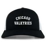 The Chicago Valkyries Retro Trucker Cap by EMB S&S Activewear is a black and white hat featuring "CHICAGO VALKYRIES" printed in bold white letters on the front, and includes a comfortable snapback closure for an adjustable fit.