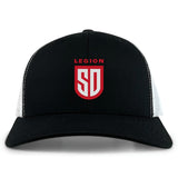 The San Diego Legion Rugby Academy Retro Trucker Cap by EMB S&S Activewear is a black and white trucker hat with a red and white "LEGION SD" embroidered front and an adjustable snapback closure.