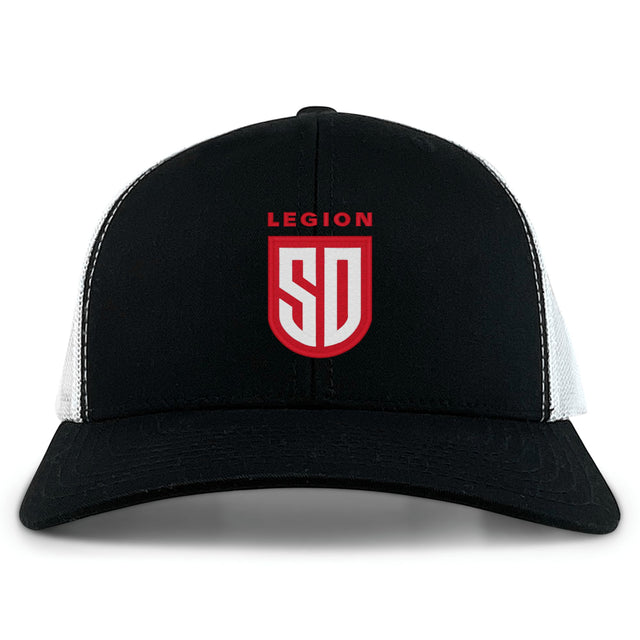 The San Diego Legion Rugby Academy Retro Trucker Cap by EMB S&S Activewear is a black and white trucker hat with a red and white "LEGION SD" embroidered front and an adjustable snapback closure.