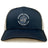 The EMB S&S Activewear Georgetown University RFC Retro Trucker Cap features a blue and white design, a front embroidered Rugby Football Club bulldog logo, and a classic snapback closure for an adjustable fit.