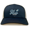 The Gulf Coast Fat Alberts Retro Trucker Cap by EMB S&S Activewear features a navy blue and white design, front embroidered "Fat Albert's Rugby" with rugby ball graphic, and a comfy snapback closure.