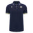 Show your support in style with the Scotland SRU 26/27 Travel Polo by Macron—a navy blue short-sleeve polo featuring a collar, white trim on the sleeves, and two embroidered logos on the chest. The perfect choice for authentic Scotland Rugby fans.