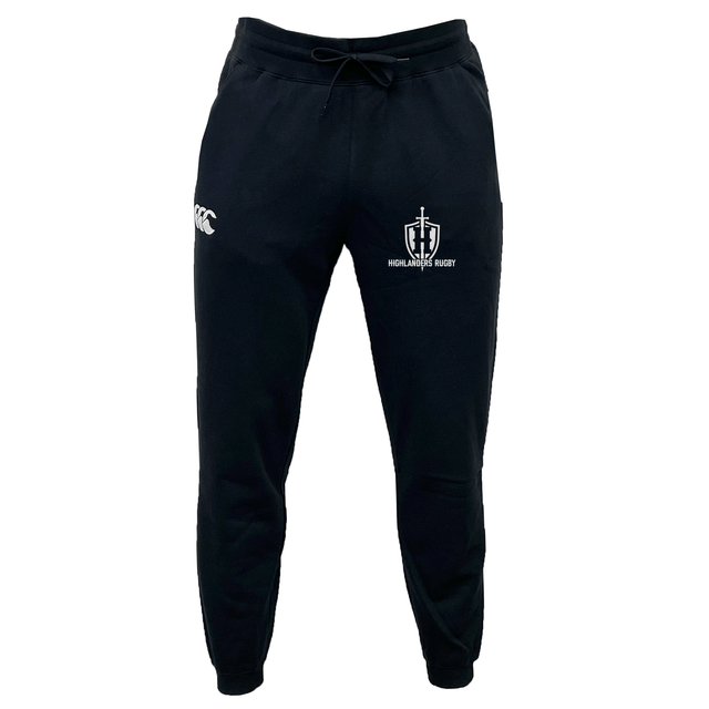 The Highlanders Rugby NC Leisure Sweatpant by EMB Canterbury sports two logos—one on the left thigh and another on the right thigh—and is crafted from recycled polyester fleece, offering a sustainable and cozy wear.
