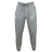 The Highlanders Rugby NC Leisure Sweatpant by Canterbury, made from gray organic cotton, features an elastic waistband and drawstring. The sweatpants have logos on both legs: a sports team's crest on the right leg and the manufacturer's emblem on the left leg.