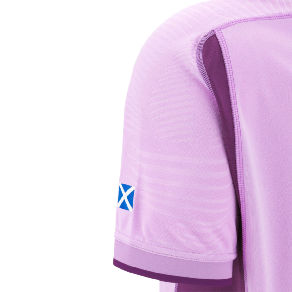 Close-up of a light purple Scotland 25/26 Replica Away Jersey sleeve by Macron, showing a small Scottish flag patch on the cuff.