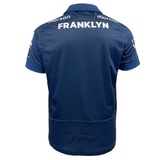 The back view of the Sale Shark Rugby 24/25 Home Jersey by Macron in navy blue, featuring "FRANKLYN" printed on the upper back, displays sponsor logos and a prominent Sale Sharks Rugby shark emblem at the bottom.