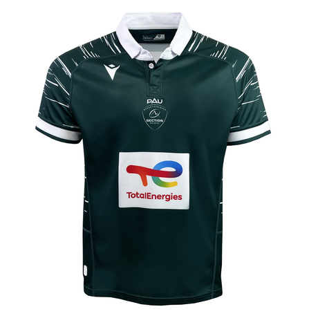 The Section Paloise Rugby 24/25 Replica Home Jersey by Macron sports a classic green and white design with a collar and official logos on the chest and sleeves, embodying the traditional spirit of a Section Paloise jersey.