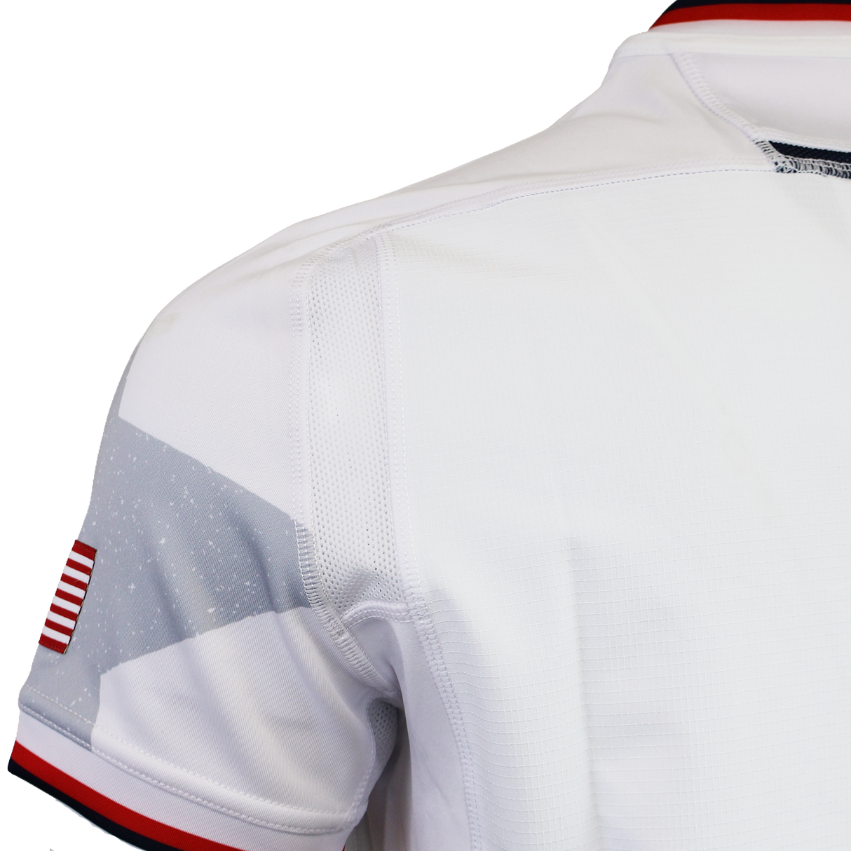 Close-up of the USA Rugby 24/25 Authentic Matchday Away Jersey by Macron, showing a small American flag patch and red, white, and blue trim on the collar and sleeve—true details of a USA Rugby jersey.