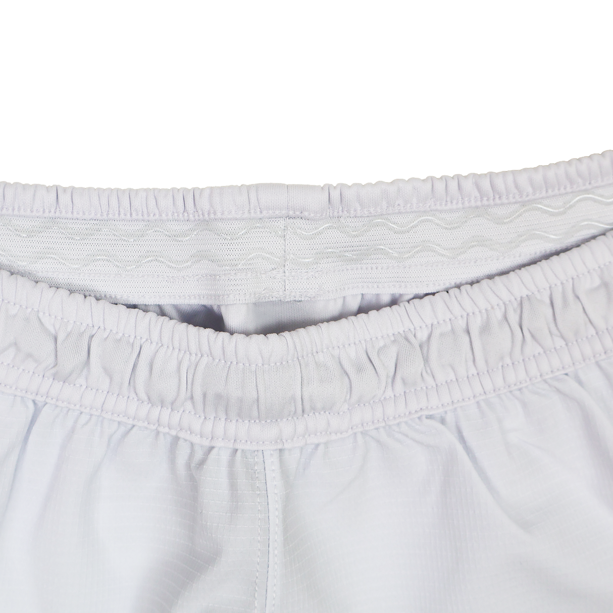 Close-up view of the waistband on the USA Rugby 24/25 Matchday Away Shorts by Macron, showing elastic detailing and stitching designed for enhanced rugby performance.