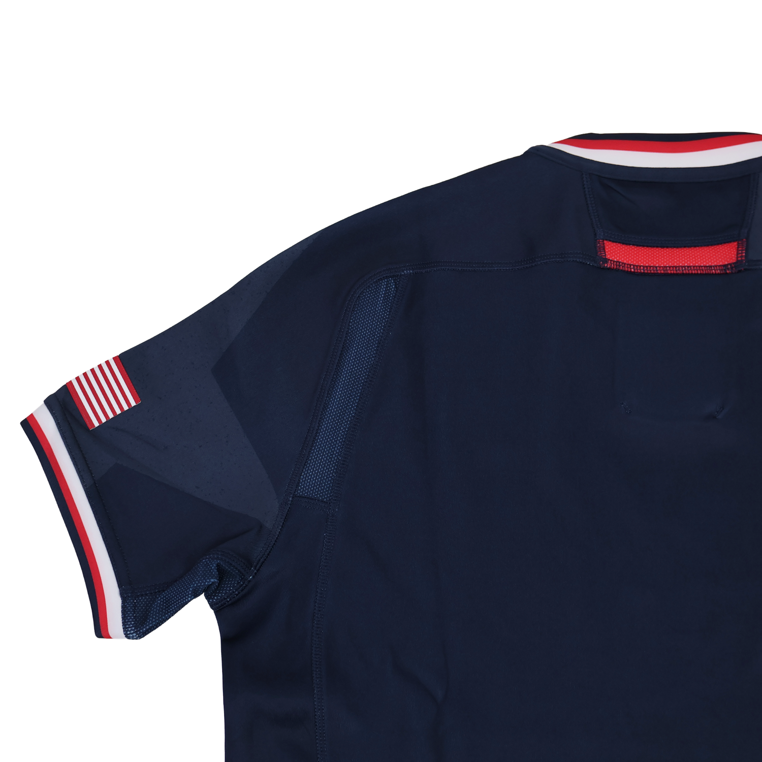 The Women's USA Rugby 24/25 Home Bodyfit Shirt by Macron features a navy blue design with red, white, and blue trim on the collar and sleeves plus a small American flag patch—perfect as an official rugby jersey.
