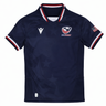 The Youth USA Rugby 24/25 Home Jersey by Macron features red, white, and blue trim, the USA Rugby logo on the chest, and an American flag patch on the sleeve—ideal for young rugby fans.