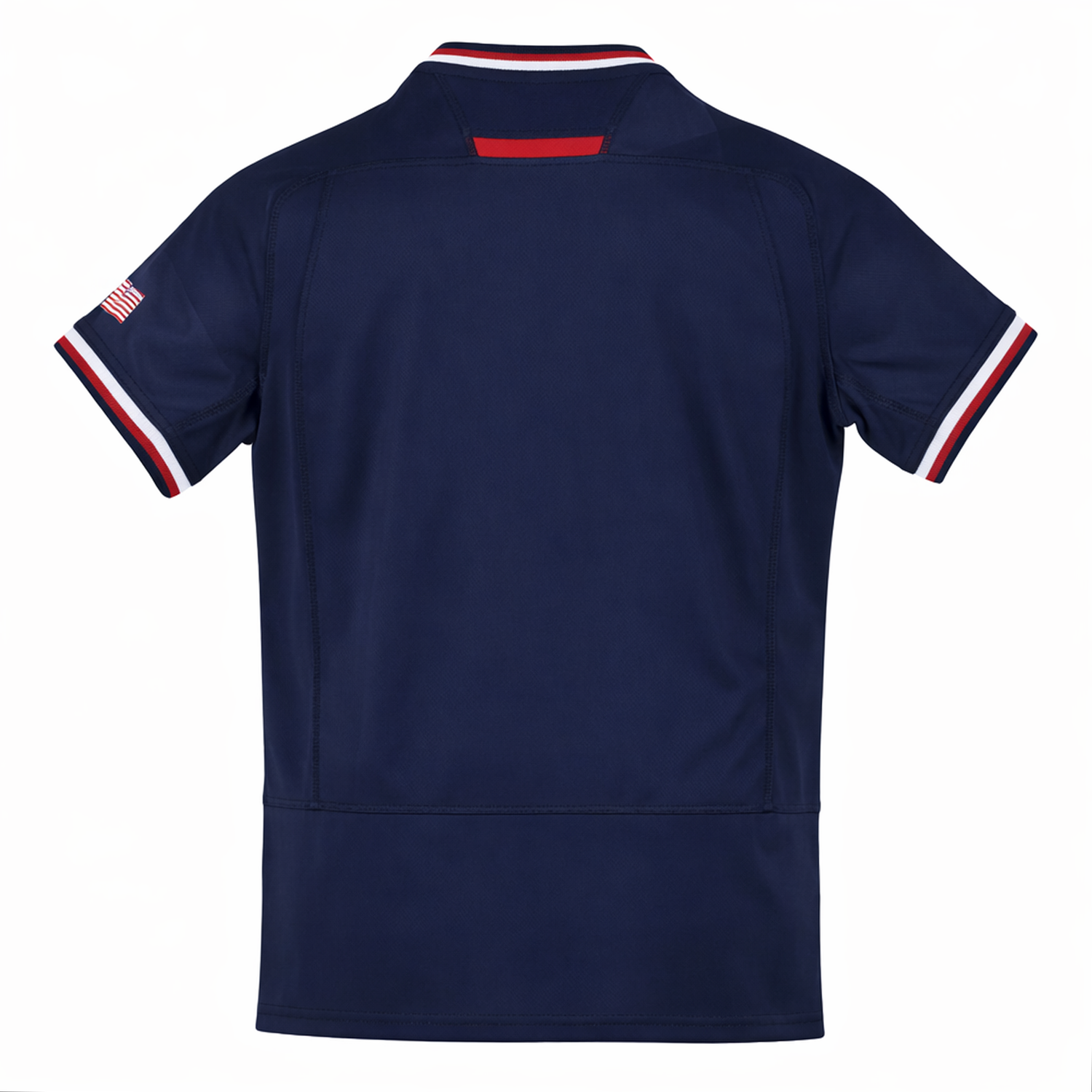 The Youth USA Rugby 24/25 Home Jersey by Macron is a navy short-sleeve rugby shirt viewed from the back, with red, white, and blue trim on the collar/sleeves and a small American flag patch on the left sleeve for classic USA Rugby style.