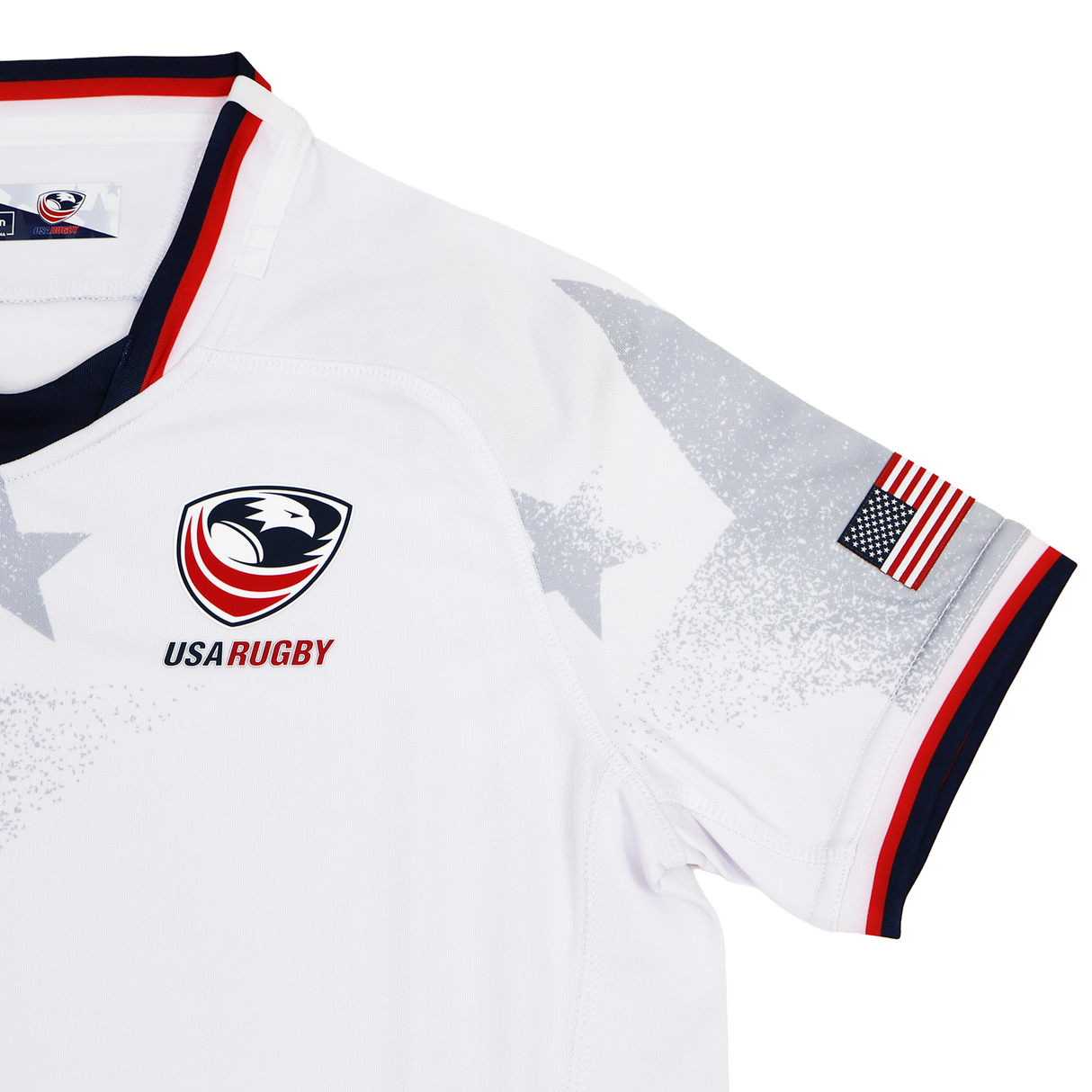 Youth USA Rugby 24/25 Away Jersey by Macron features an eagle logo, “USA RUGBY” text, American flag sleeve patch, red/white/blue trim, and subtle star patterns on the shoulder.