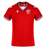The USA Rugby 24/25 Red Replica Training Jersey by Macron features dark blue and white accents, a zigzag front pattern, and the Macron logo—ideal for fans wanting an authentic training jersey look.