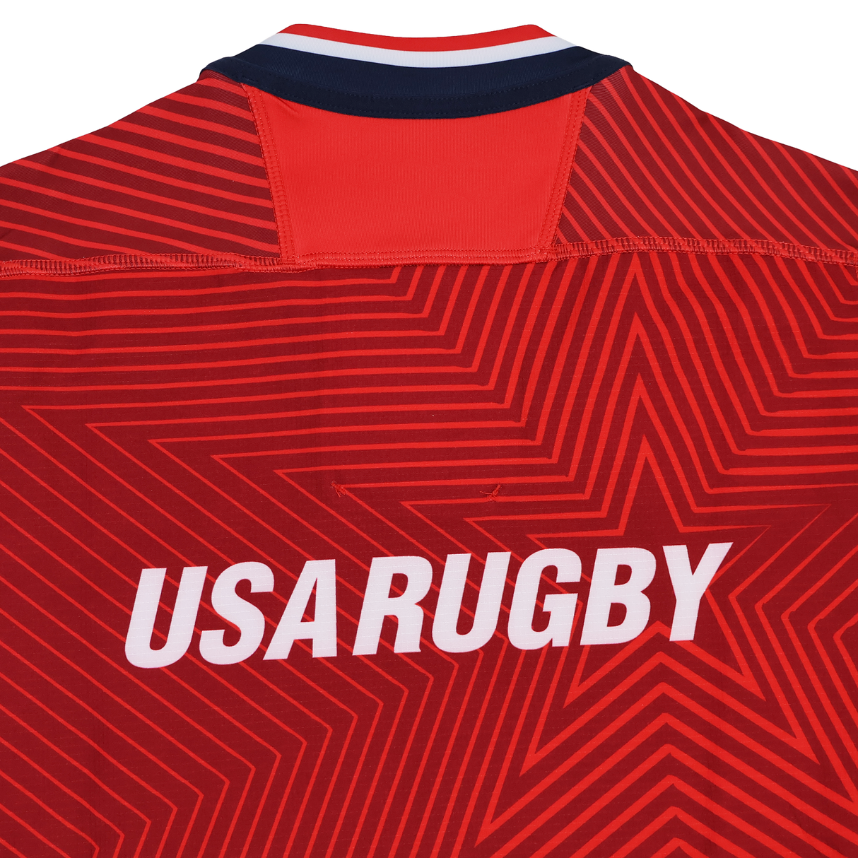 The USA Rugby 24/25 Red Replica Training Jersey by Macron features bold white "USA RUGBY" text and a striking star pattern on the back.
