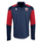 The USA Rugby 25 Player 1/4 Zip Training Top by Macron is navy blue with red and dark blue sleeves, featuring a white USA Rugby logo on the left chest and a Macron logo on the right chest.