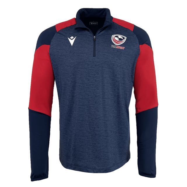 The USA Rugby 25 Player 1/4 Zip Training Top by Macron is navy blue with red and dark blue sleeves, featuring a white USA Rugby logo on the left chest and a Macron logo on the right chest.
