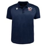The USA Rugby 25 Travel Poly Polo by Macron is a navy blue, short-sleeve polo featuring the USA Rugby logo on the left chest and a white Macron logo on the right chest.