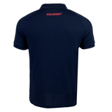 Navy blue USA Rugby 25 Travel Poly Polo by Macron, viewed from the back with "USA RUGBY" in bold red below the collar—support the Eagles in style with this short-sleeve Macron polo.