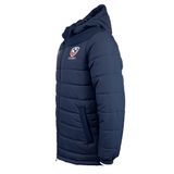 USA Rugby 25 Padded Jacket by Macron in navy blue, featuring a quilted padded design and USA Rugby logo, with Macron branding on the chest, shown from a side angle.