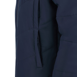 This close-up of the USA Rugby 25 Padded Bench Jacket by Macron in navy blue showcases quilted details and a zippered pocket, embodying the craftsmanship Macron is known for. It's ideal for any USA Rugby fan.