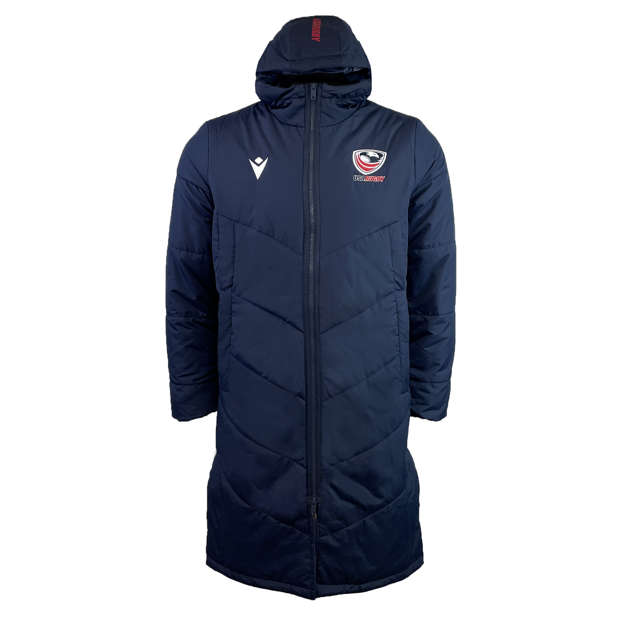 The USA Rugby 25 Padded Bench Jacket by Macron is a navy blue, long hooded jacket with a front zipper. It features the USA Rugby logo on the left chest and an emblem on the right.