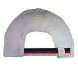 The USA Rugby 25 White Baseball Cap by Macron features a back view with a navy and red striped adjustable strap, accented by a small logo tag. Ideal for USA Rugby fans, this cap reflects Macron's commitment to quality and style.