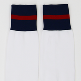 The USA Rugby M25/26 Home Socks by Macron are white performance socks featuring navy blue cuffs and a red horizontal stripe near the top, designed for comfort and durability.