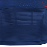 The USA Rugby 25/26 Away Body Fit Match Jersey by Macron features navy blue fabric with "USA" in large letters and a top section decorated with small red and blue stars, reflecting the authentic style of a Macron rugby jersey.