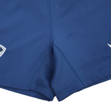 Close-up of blue USA Rugby 25/26 Away Shorts by Macron, featuring stitched seams and small white Macron logos on each leg.