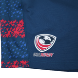 Close-up of a blue USA Rugby uniform with the eagle logo and star pattern, paired with the USA Rugby 25/26 Away Shorts by Macron—moisture-wicking rugby shorts from Macron.